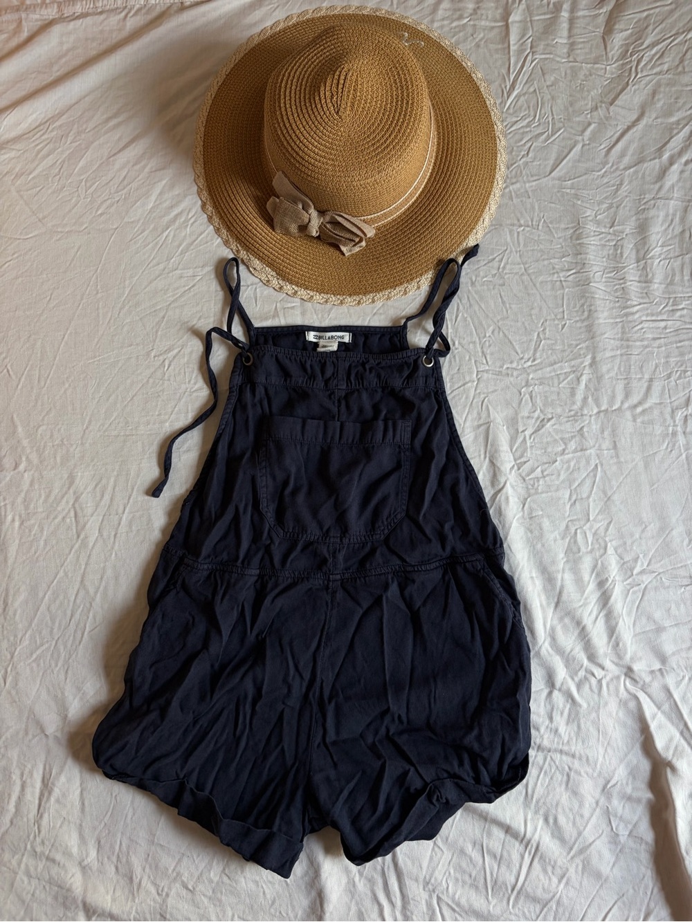 Young Woman’s Navy One-Piece Romper